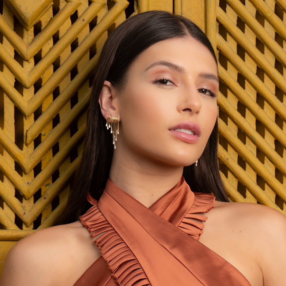 Brincos Ritmo em Ouro Amarelo com Diamantes